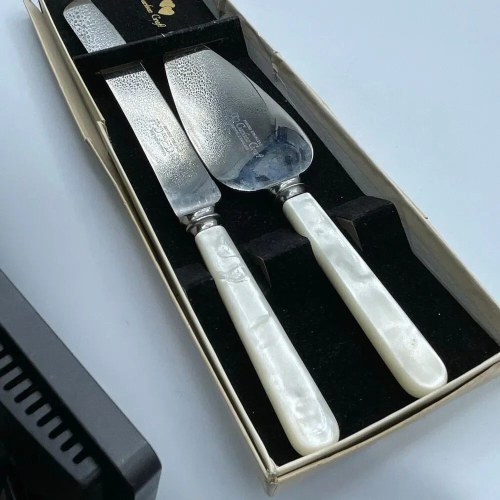 Vintage Carlson Craft Sheffield ,England knife and server set.